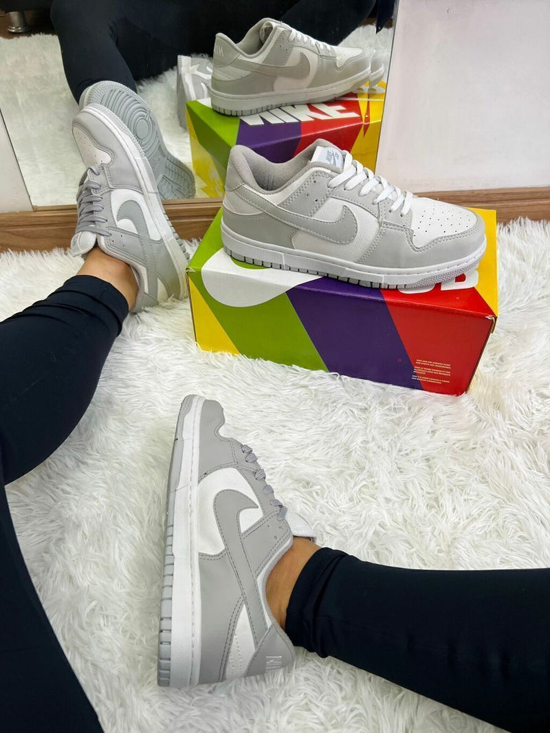 TÊNIS NIKE DUNK LOW SB – Cinza e Branco
